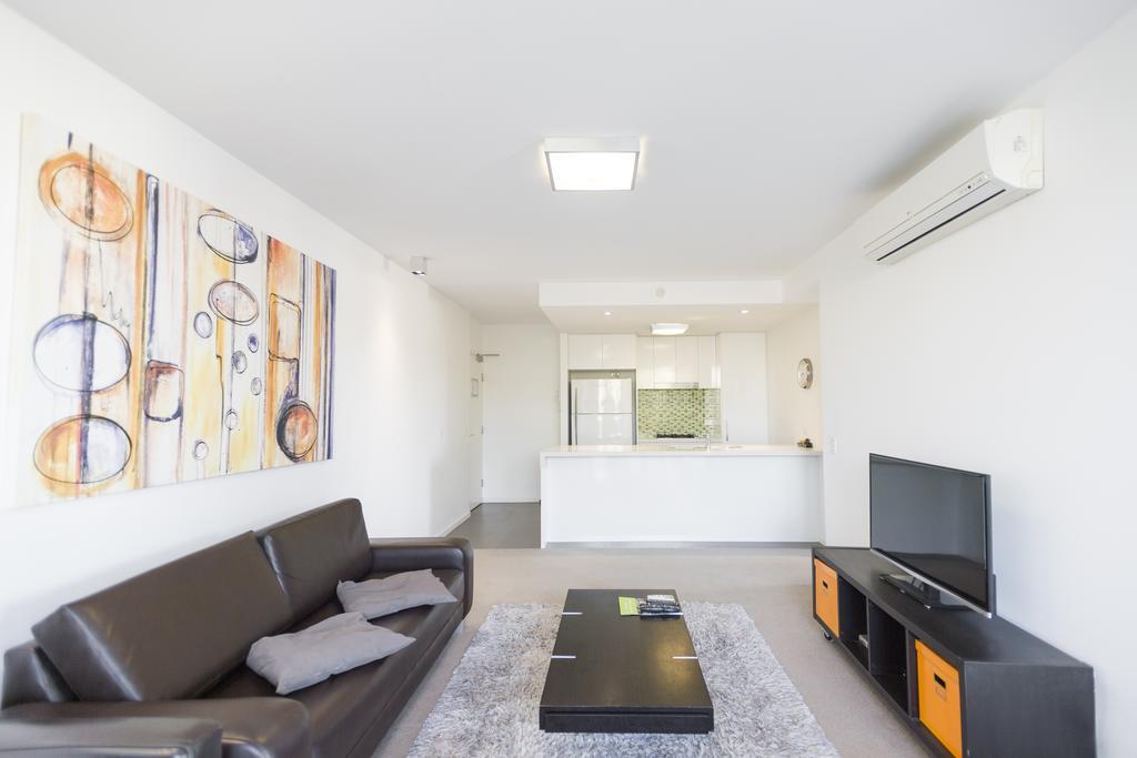 Eastwood Apartments Brisbane Exterior photo A living room with a flat screen television