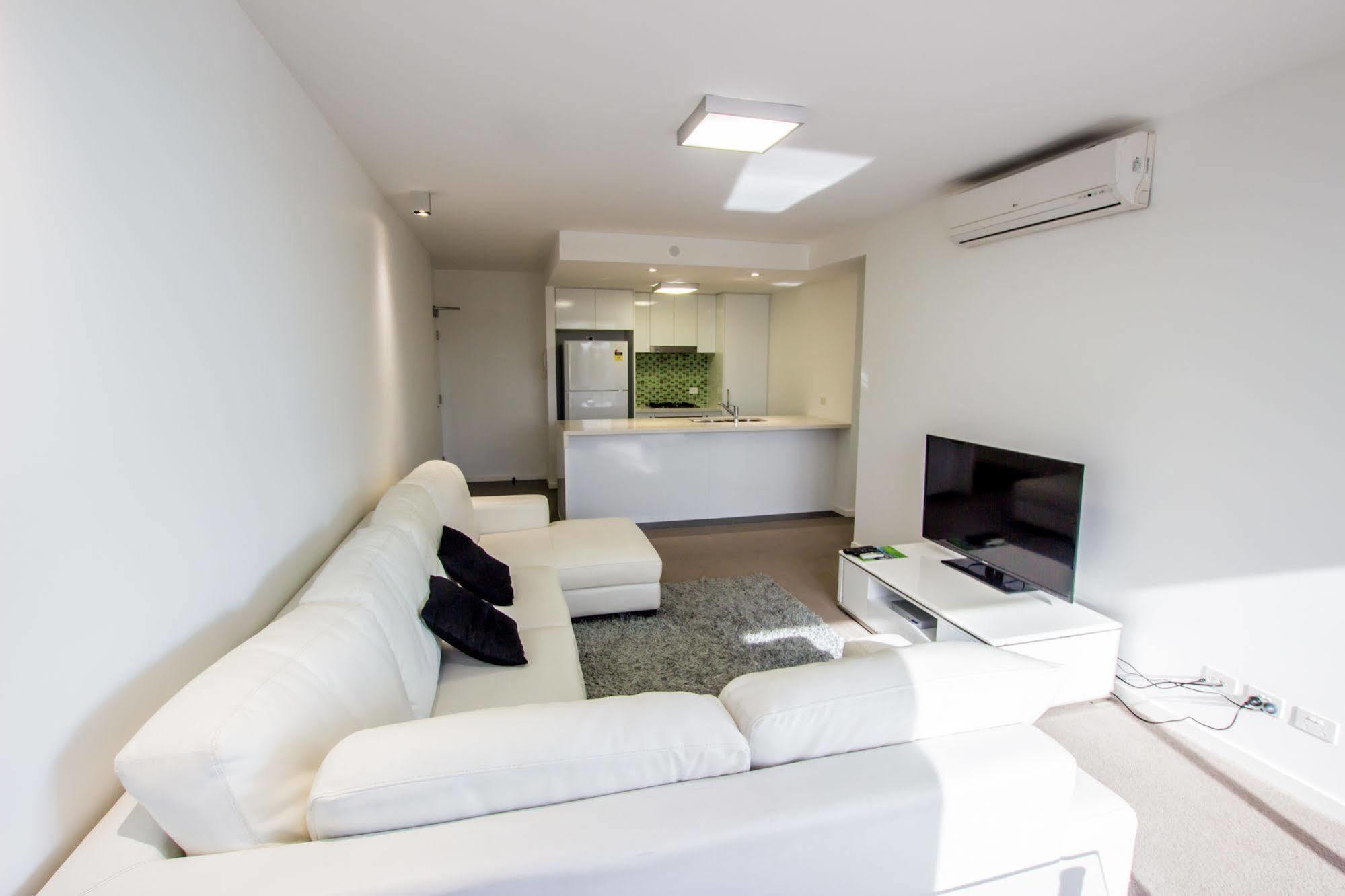 Eastwood Apartments Brisbane Exterior photo A living room in a modern apartment